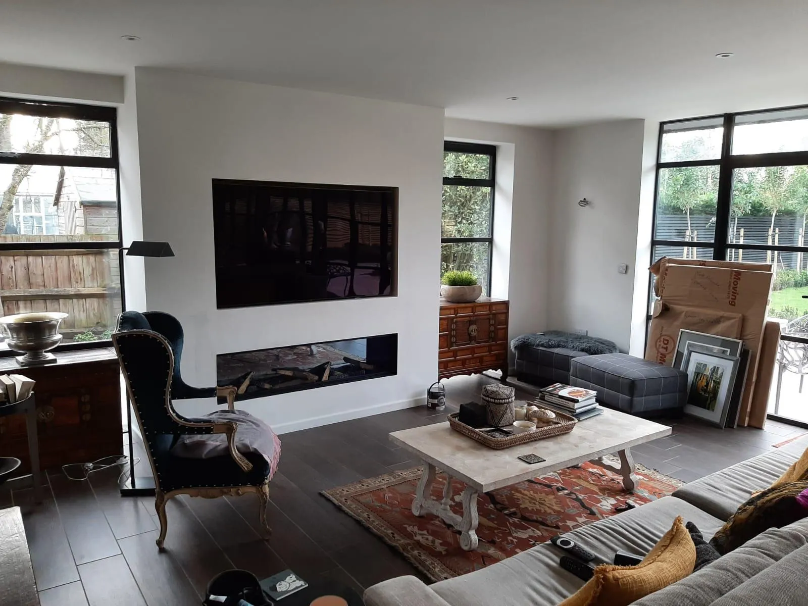 A living room filled with furniture and a flat screen tv.